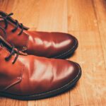 pair of brown leather lace-up boots